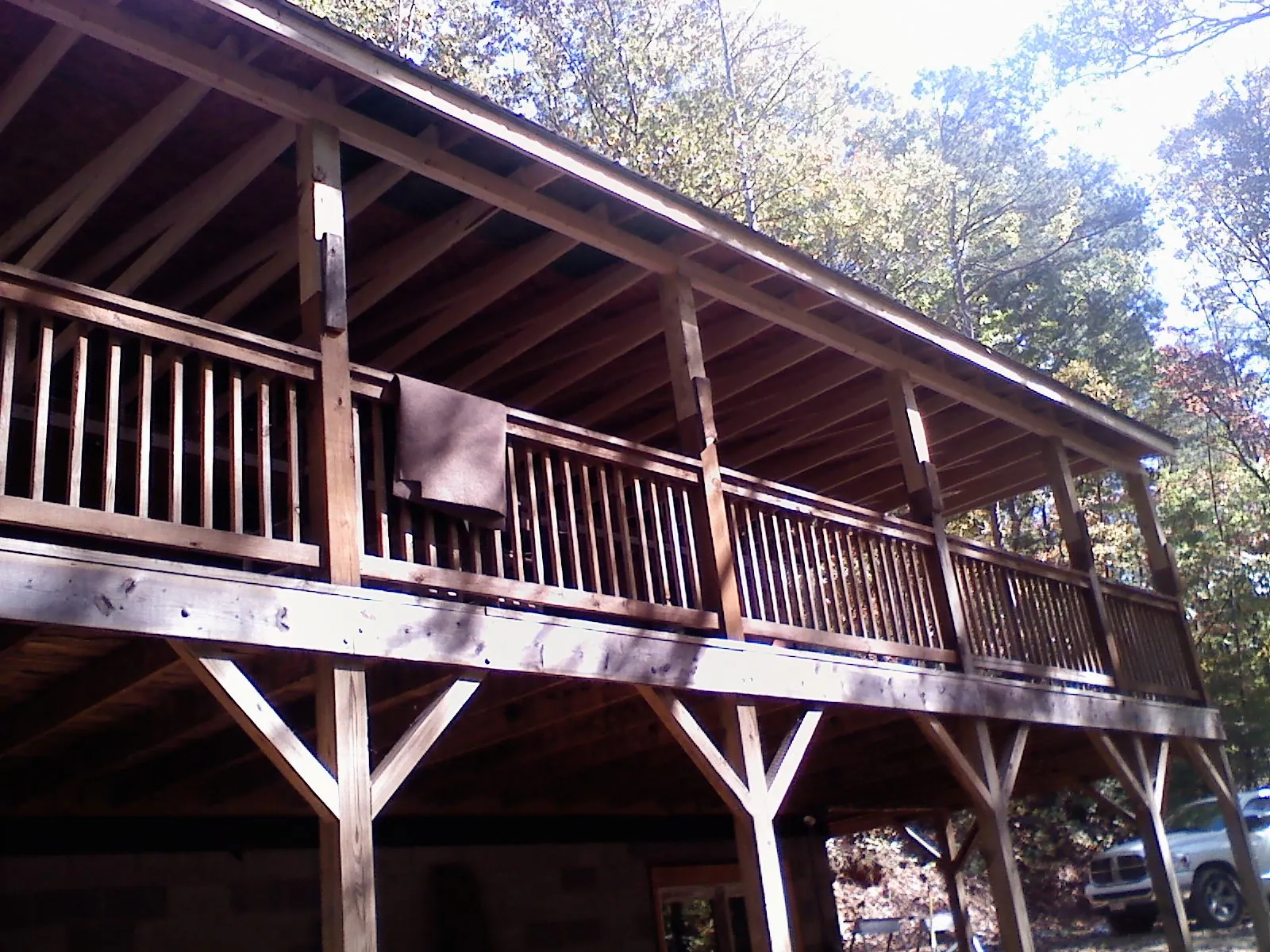 Timber framing under a new elevated porch and deck — Roof Leak Repair in Newberry by Roofing Brothers